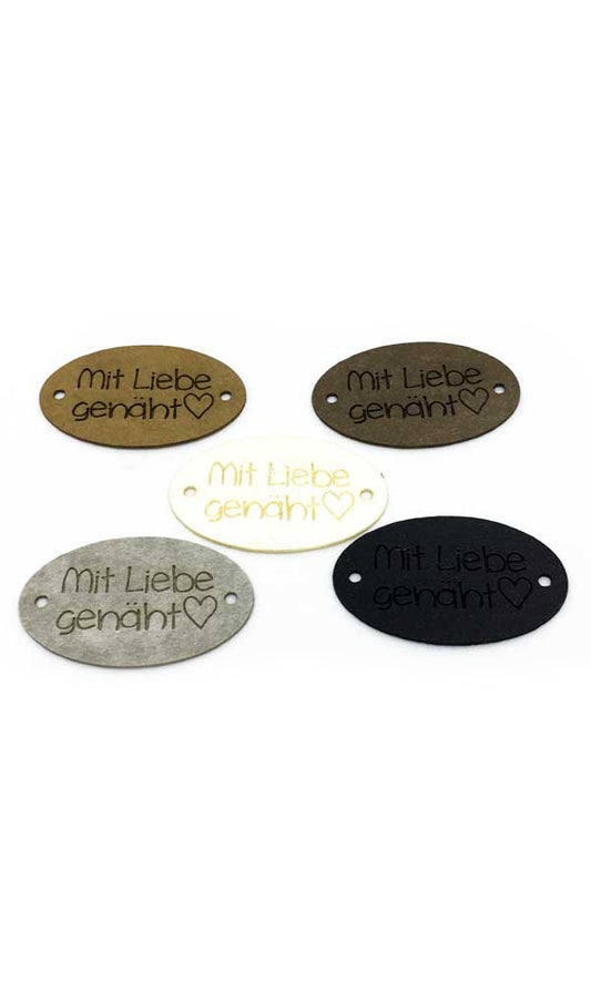 Label oval "with 🖤 sewn", 30 x 19 mm