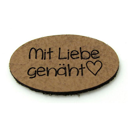 Label oval "with 🖤 sewn", 30 x 19 mm