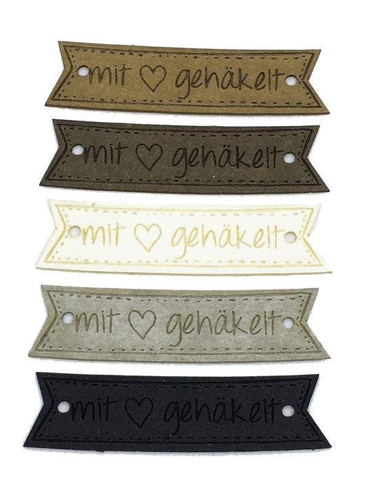 Label flag "crocheted with 🖤"