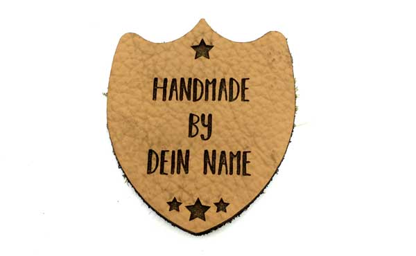 Coat of arms "Handmade by" with desired text 